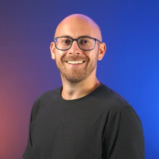 Headshot of Evan Nicoles